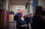 07 November 2018, Berlin: Monica Bonvicini (M), artist from Italy, gives an interview before the opening of the exhibition "1914/1918 - Not Then, Not Now, Not Never" in the parliamentary lobby of the Reichstag building next to her artwork "Cut, Cut, not Paste", which presents chains next to a bolt cutter on a tree stump. At the end of the First World War on 11 November 1918, exactly 100 years ago, the exhibition presents works by international artists who wanted to set an example for peace. The exhibition can be seen from 10 November 2018 to 6 January 2019 as part of guided tours of the Bundestag. Photo: Arne Immanuel Bänsch/dpa (Photo by Arne Immanuel Bänsch/picture alliance via Getty Images)