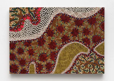 An abstract paintings that looks like it is made of various textiles juxtaposed together.