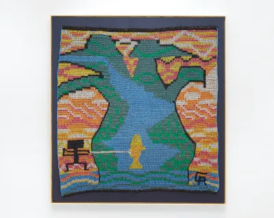 A textile that is semi-abstract but appears to look like the banks of a river against a forest.
