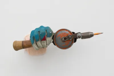 A sculpture of a worker