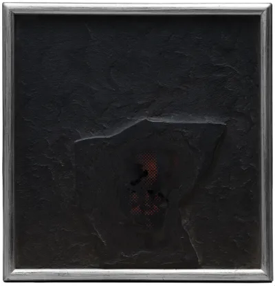 An all black painting with a raised figure emerging from it.