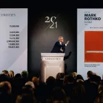 Auctioneer Jussi Pylkkänen takes bids at the Christie
