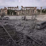 BAALBEK, LEBANON - NOVEMBER 7: A view of destruction to a hotel, walkway and shops from an Israeli airstrike which struck the day before in front of Baalbeks Unesco World Heritage site ancient ruins on November 7, 2024 in Baalbek, Lebanon. Israel has increasingly targeted Lebanon