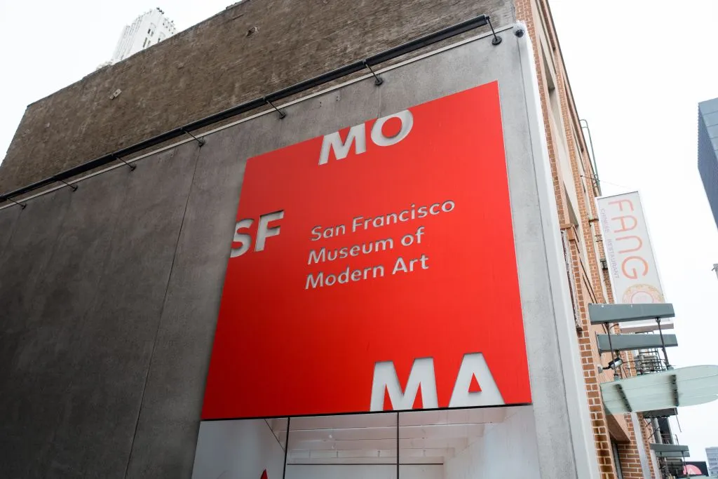 Bright red sign for the San Francisco Museum of Modern Art (SFMoMA) in the South of Market or SoMA neighborhood of San Francisco, California, August 2, 2018. (Photo by Smith Collection/Gado/Getty Images)
