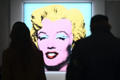 Portrait of Marilyn Monroe installed in gallery