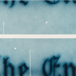 Blue image with middle white strip separate black text reading 