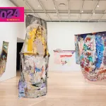 Hanging paintings composed of layers of multihued gel.