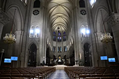 This photograph shows the new main altar (C), designed by French artist and designer Guillaume Bardet which replaces the old one that was destroyed in 2019, after a mass at the Notre-Dame de Paris cathedral, in Paris on December 8, 2024. Newly restored Notre Dame cathedral is set to hold its first service for the public on December 8, 2024 after a historic re-opening ceremony that saw firefighters, builders and artists celebrated for their work saving the 12th-century masterpiece. The beloved Paris monument nearly burned down in 2019, but has been renovated inside and fitted with a new roof and spire during a frenzied reconstruction effort since then. (Photo by JULIEN DE ROSA / AFP) / RESTRICTED TO EDITORIAL USE - MANDATORY MENTION OF THE ARTIST UPON PUBLICATION - TO ILLUSTRATE THE EVENT AS SPECIFIED IN THE CAPTION (Photo by JULIEN DE ROSA/AFP via Getty Images)
