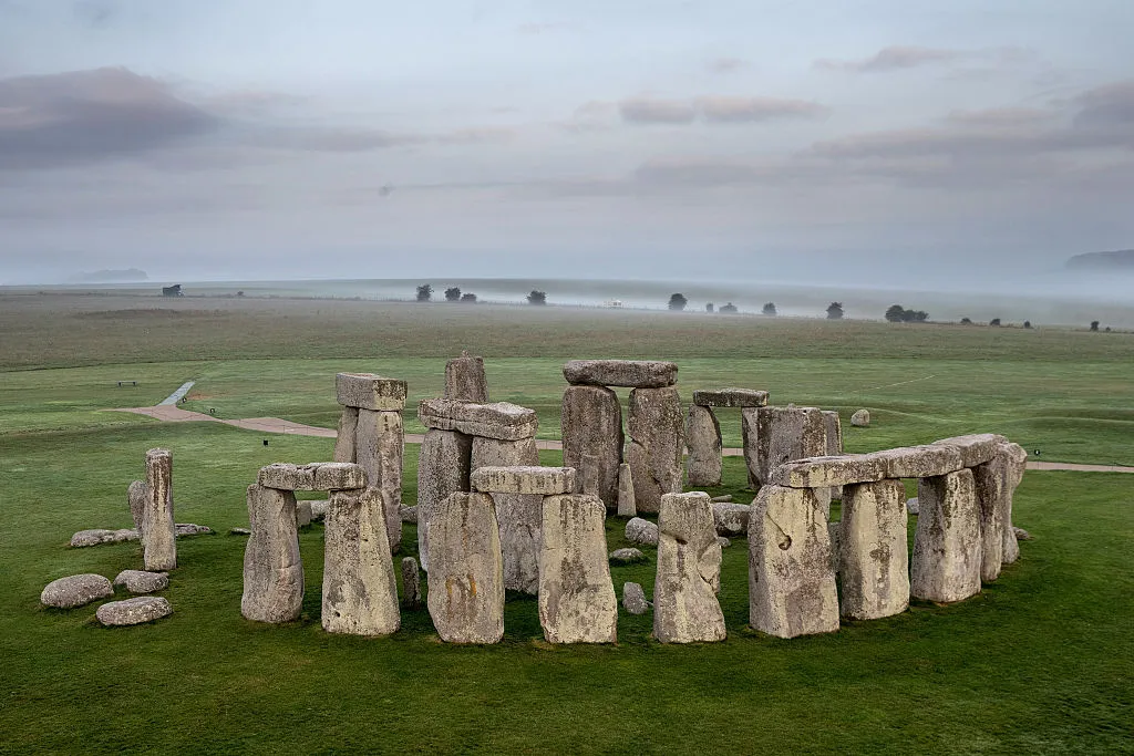 The ancient neolithic monument of Stonehenge near Amesbury is viewed from a hot air balloon on September 7, 2016 in Wiltshire, England. To mark the 30th anniversary of Stonehenge becoming a World Heritage Site, English Heritage has launched a competition offering members of the public the chance of a hot balloon ride which allows the chance to see a unique view of Stonehenge within in a wider prehistoric landscape but also the see the recent changes to its setting in recent years including the removal of the A344 and the old car park. (Photo Matt Cardy/Getty Images)