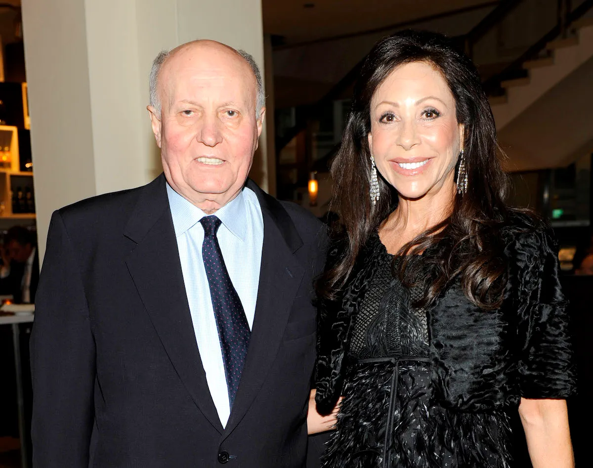 A smiling man and woman.