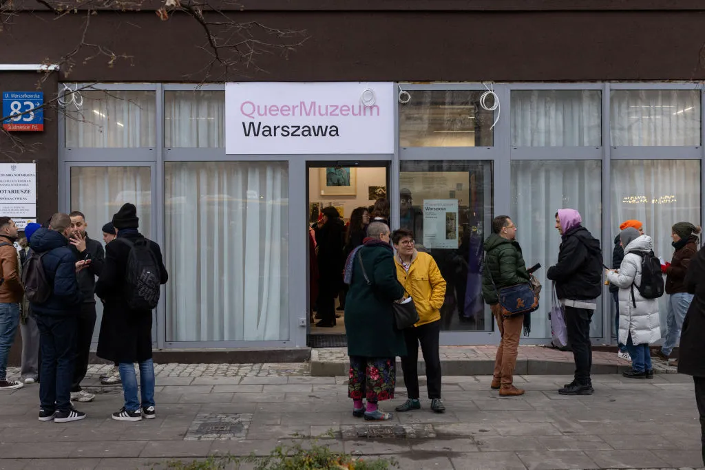 People gather on the street at the opening of Poland