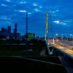 Interstate 30 leading to downtown Dallas, at dusk featuring Margaret Hill Bridge.