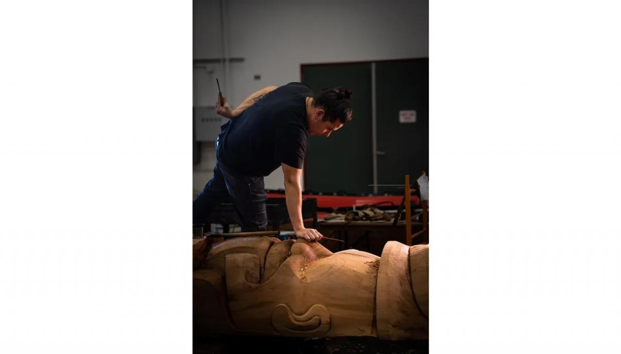 Artist Nicholas Galanin (Tlingit-Unangax̂) at work over a large sculpture. On December 18, Crystal Bridges Museum of American Art announced Galanin had won the 2024 Don Tyson Prize for the Advancement of American Art, worth 0,000.