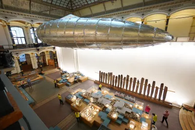 A hanging sculpture resembling a blimp.