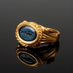 This gold ring featuring an engraving of Venus Victrix found in Pace, Brittany, France.