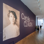 A photograph of a woman next to the words 