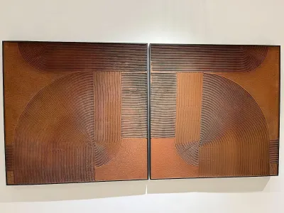 An abstract painting formed from cracked clay.