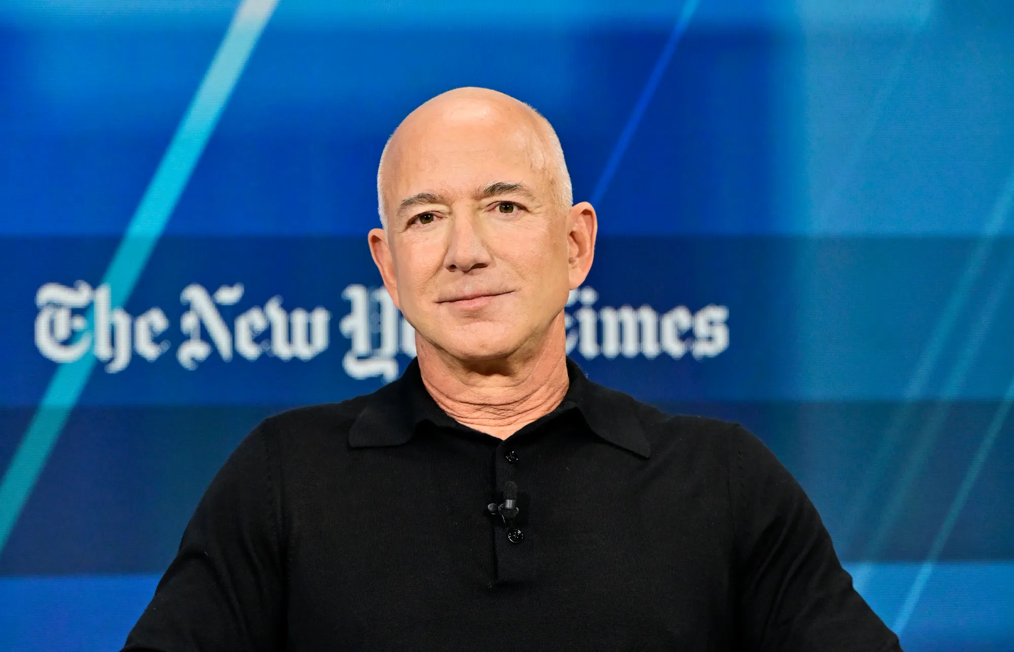 NEW YORK, NEW YORK - DECEMBER 04: Jeff Bezos speaks onstage during The New York Times Dealbook Summit 2024 at Jazz at Lincoln Center on December 04, 2024 in New York City.  (Photo by Eugene Gologursky/Getty Images for The New York Times)