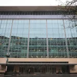 Rain falls on the National Endowment for the Humanities building (NEH) on April 11, 2025 in Washington, DC. The NEH has begun laying off staff after President Donald Trump and the Department of Government Efficiency