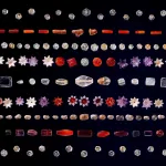 An arrangement of dozens of Indian gems, including ones shaped like flowers, laid on a black surface. They include They include amethysts, coral, garnets, pearls, rock crystals, shells and gold, either worked into pendants, beads, and other ornaments, or in their natural form. The image of the Piprahwa gems is from a listing on the Sotheby