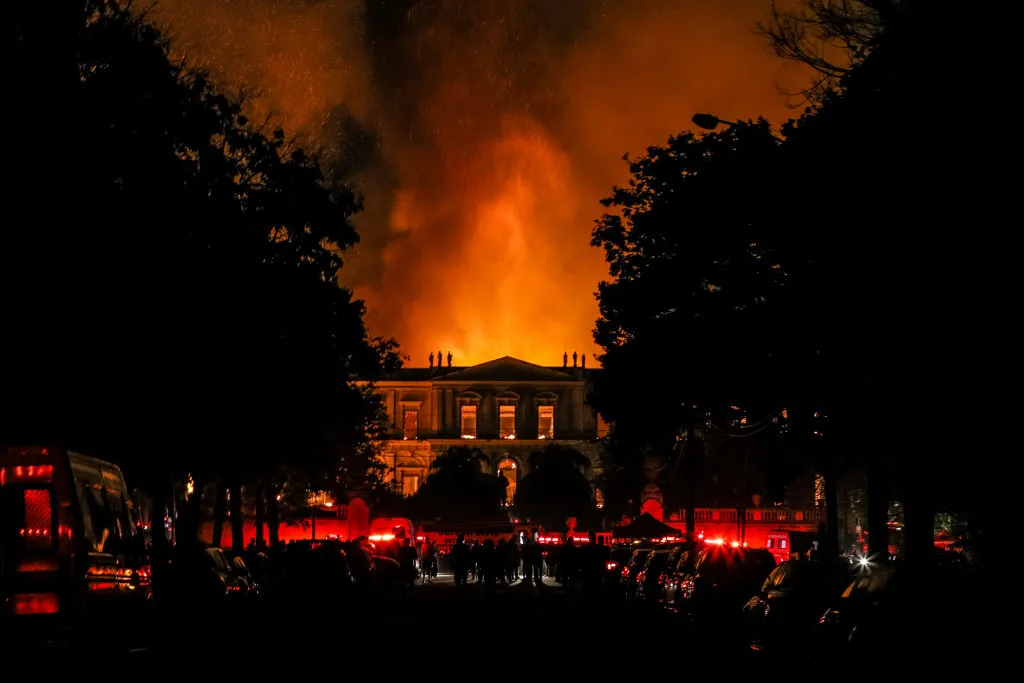 A fire burning a big building.