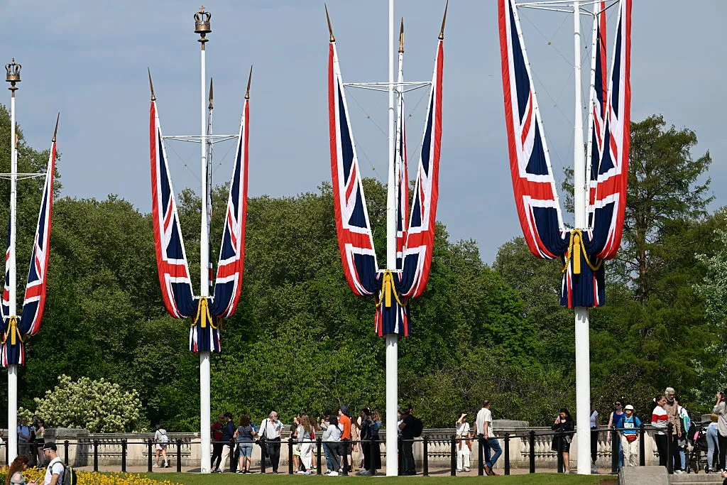 Tourists outside Buckingham Palace in St James
