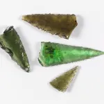 Four of the ten glass spearheads being returned by the Fowler Museum. Courtesy of the Fowler Museum, UCLA.