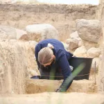 An archaeologist excavating the tomb