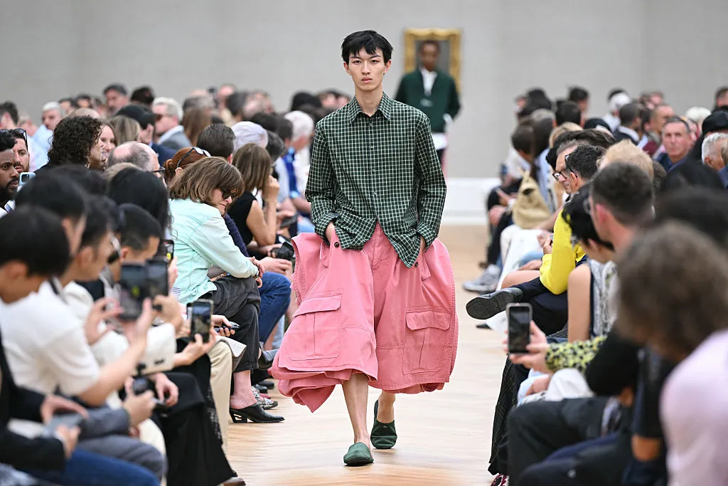 TOPSHOT - A model presents a creation by Dior Homme for the Menswear Ready-to-wear Spring-Summer 2026 collection as part of the Paris Fashion Week in Paris, on June 27, 2025. (Photo by Bertrand GUAY / AFP) (Photo by BERTRAND GUAY/AFP via Getty Images)