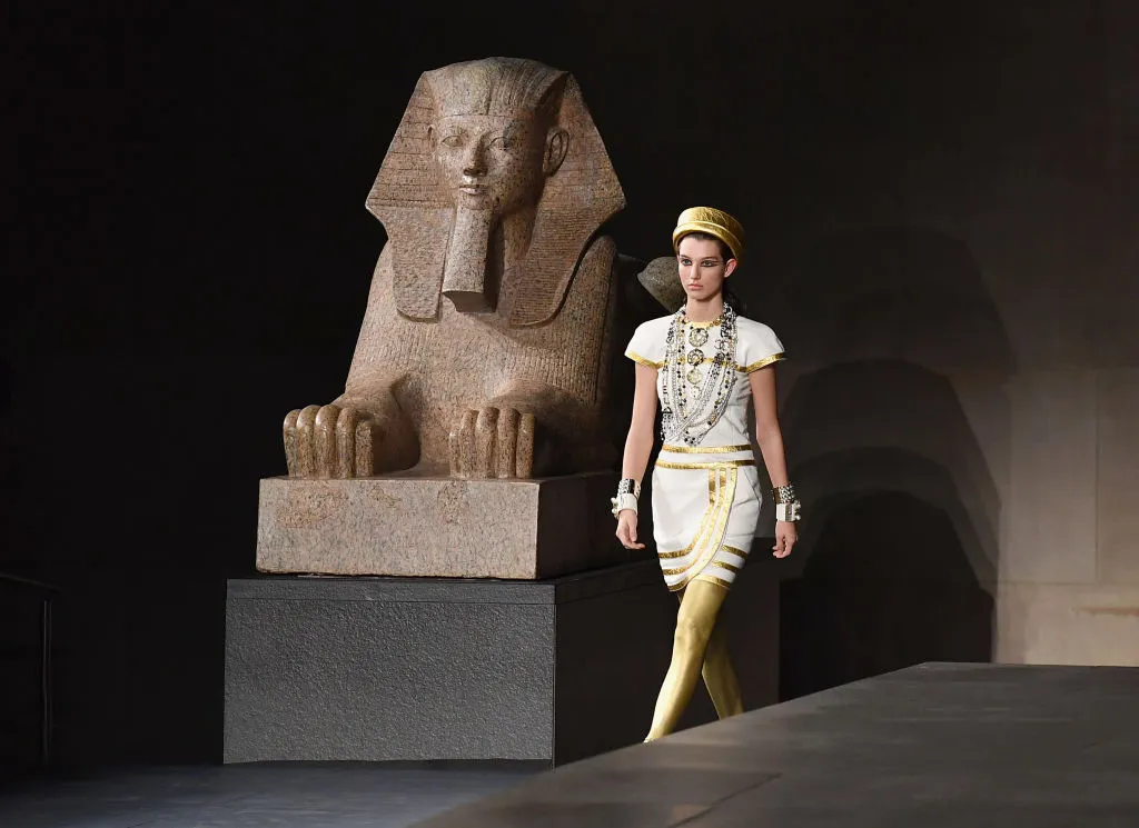 A model walks the runway during the Chanel Metiers D