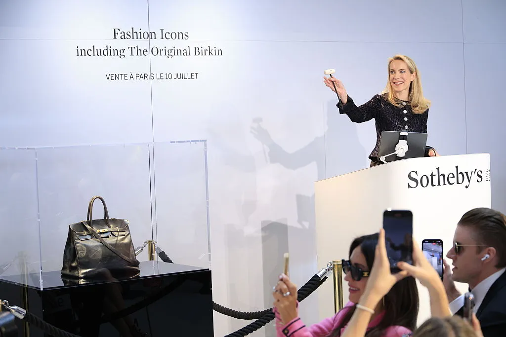 PARIS, FRANCE - JULY 10: Auctioneer Aurélie Vandevoorde is pictured during the sale of the Jane Birkin bag for €8.6 million euros at Sotheby