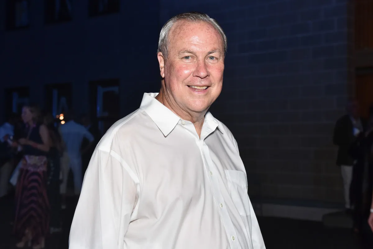 A man in a white button-down shirt.