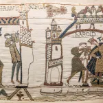Part of ancient tapestry showing a king and his minions.