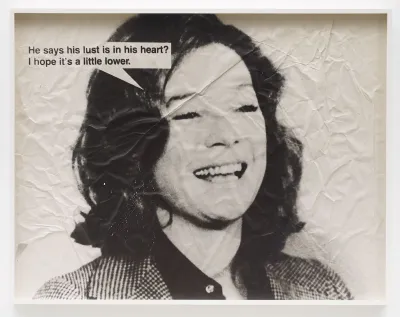 A crumpled picture of a laughing woman with a speech bubble reading 