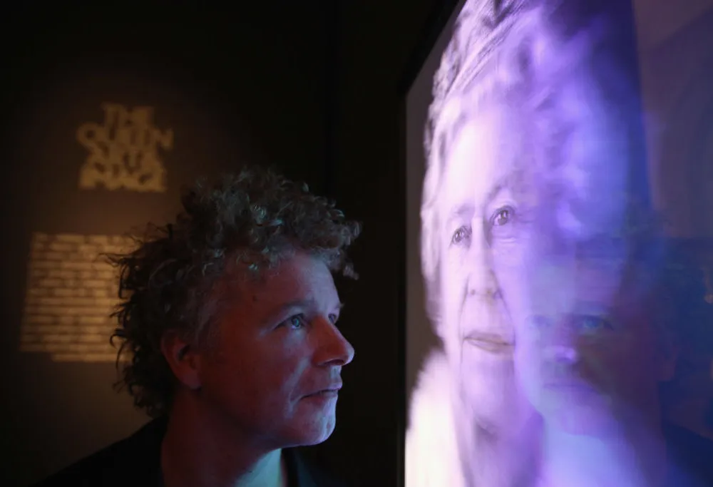 LONDON, ENGLAND - MAY 16:  Artist Chris Levine views his hologram image of Her Majesty Queen Elizabeth II entitled