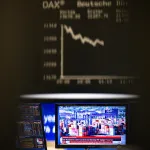A screen beneath a graph with a declining line.