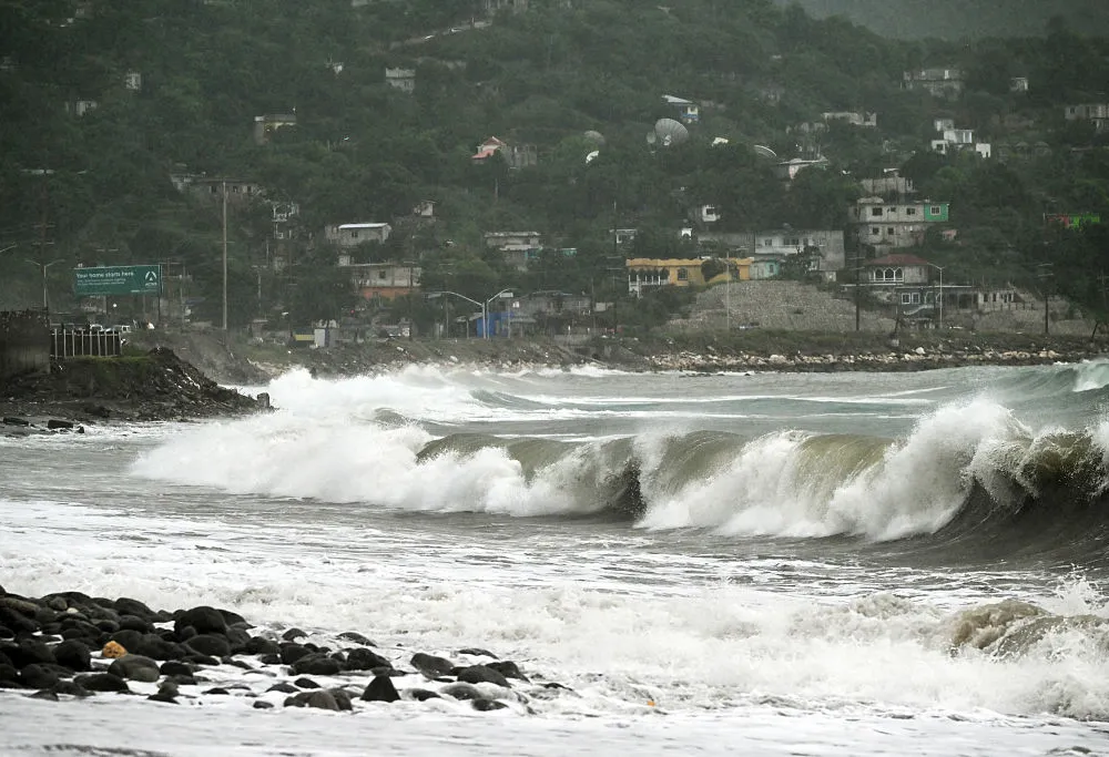 Storm surge is pictured before the arrival of Hurricane Melissa in the Caribbean Terrace area of Kingston, Jamaica, on October 25, 2025. Deadly storm Melissa strengthened Saturday afternoon into a Category 1 hurricane, with rapid intensification expected over the weekend as it cut a worryingly slow course toward the Caribbean island of Jamaica, forecasters said.