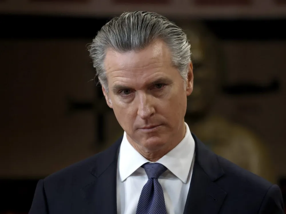 SAN FRANCISCO, CALIFORNIA - JANUARY 16: California Gov. Gavin Newsom looks on during a press conference at Friendship House Association of American Indians on January 16, 2026 in San Francisco, California. California Gov. Gavin Newsom joined San Francisco Mayor Daniel Lurie to announce new funding for homelessness and mental health efforts in the city of San Francisco. The governor announced more than 0 million in new state funding for San Francisco, Los Angeles, and San Diego as part of the state