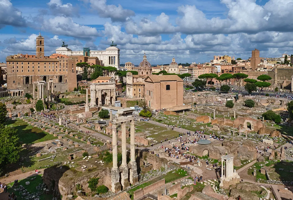 Italy, Rome: Roman vestiges surrounding the Roman Forum, Foro Romano, on the Palatine Hill. The Curia building and the Arch of Septimius Severus. (Photo by: Lachas D/Alpaca/Andia/Universal Images Group via Getty Images)