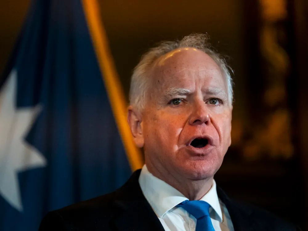 Portrait of Tim Walz speaking.