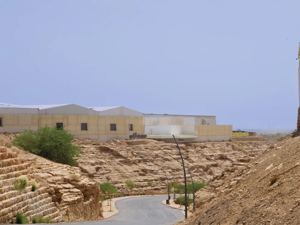 A desert scene with buildings.