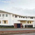 A gallery next to a road.