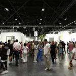 MIAMI BEACH, FLORIDA - DECEMBER 05: EDITORIAL USE ONLY Guests attend the Art Basel Miami Beach VIP Preview 2025 at Miami Beach Convention Center on December 05, 2025 in Miami Beach, Florida. (Photo by Arturo Holmes/Getty Images)