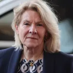 Presidential advisor Catherine Pegard looks on during a visit by France