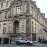 French police officers stand next to a furniture elevator used by robbers to enter the Louvre Museum, on Quai Francois Mitterrand, Paris, France, on October 19, 2025.