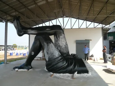 A giant sculpture of the lower half of someone