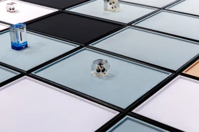 A metal grid with objects arranged on it.