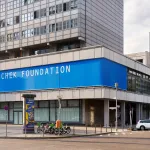 Exterior view of a building that reads 