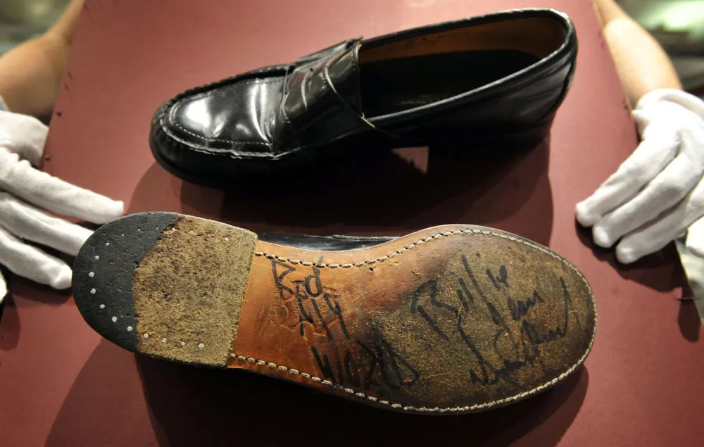 A pair of black fedora loafers, worn by Michael Jackson for the September 2001 concerts at Madison Square Garden - and signed by the pop star are seen during a Entertainment Memorabilia sale photocall Bonhams in London.   (Photo by Tim Ireland/PA Images via Getty Images)