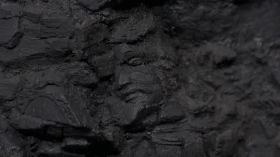 A face carved into a rock formation.